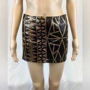 Crystal K Black & Gold Sequin Geometric Mini Skirt
Size:M Fabric:100%Poly+Cotton